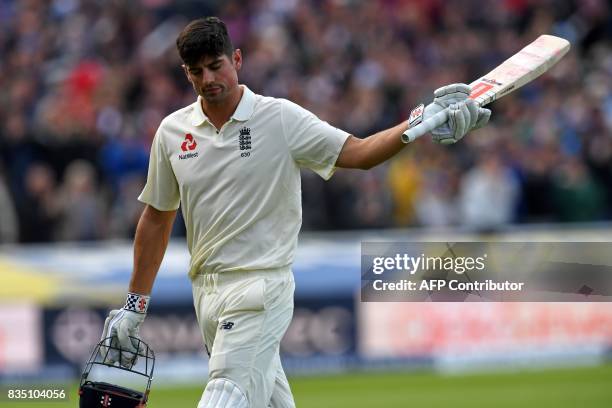 England's Alastair Cook leaves the field after losing his wicket for 243 during play on day 2 of the first Test cricket match between England and the...