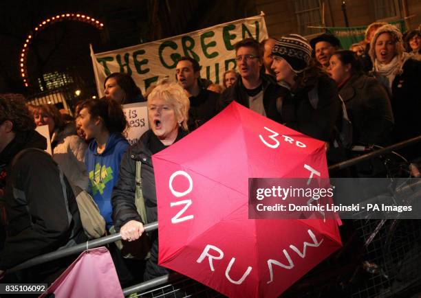 Protestors demonstrate outside Downing Street in Westminster, London, against government plans to build a third runway at Heathrow Airport.