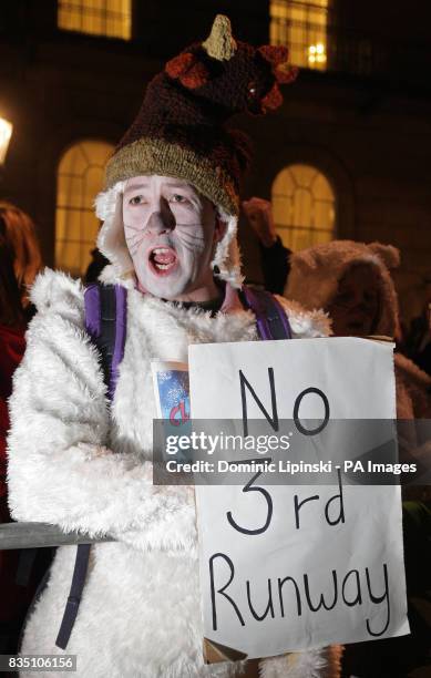 Protester dressed as a polar bear demonstrates outside Downing Street in Westminster, London, against government plans to build a third runway at...