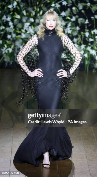 Model, Jaquetta Wheeler on the catwalk during the Qasimi show at London Fashion Week, St Mary's Church, London.