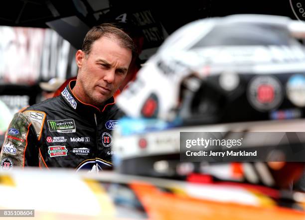 Kevin Harvick, driver of the Busch Outdoors Ford, stands by his car during practice for the Monster Energy NASCAR Cup Series Bass Pro Shops NRA Night...