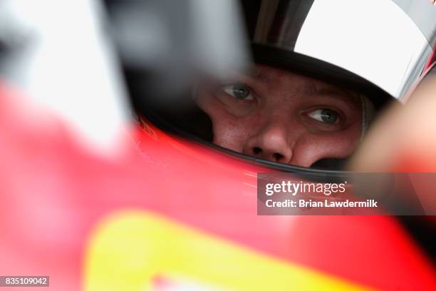 Erik Jones, driver of the 5-hour ENERGY Extra Strength Toyota, sits in his car during practice for the Monster Energy NASCAR Cup Series Bass Pro...