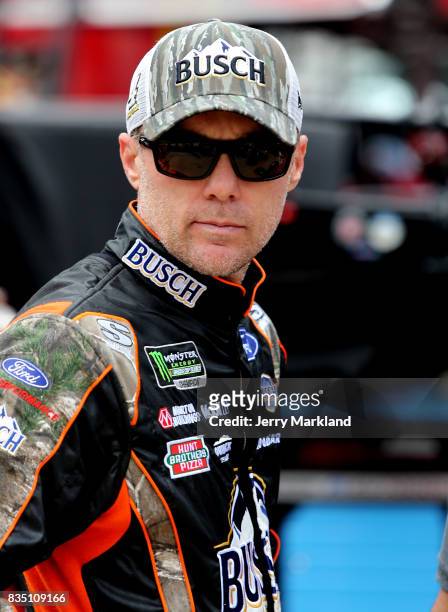 Kevin Harvick, driver of the Busch Outdoors Ford, stands by his car during practice for the Monster Energy NASCAR Cup Series Bass Pro Shops NRA Night...