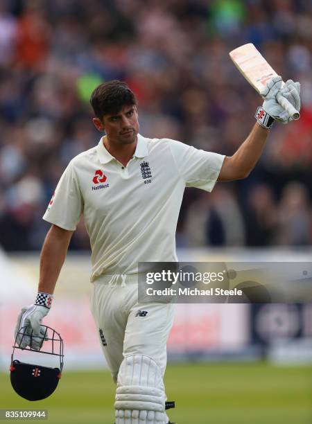 Alastair Cook of England raises his bat after being dismissed for 243 during day two of the 1st Investec Test match between England and West Indies...