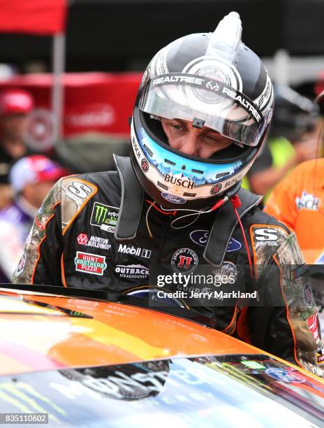 Kevin Harvick, driver of the Busch Outdoors Ford, gets into his car during practice for the Monster Energy NASCAR Cup Series Bass Pro Shops NRA Night...