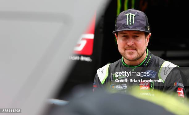 Kurt Busch, driver of the Monster Energy/Haas Automation Ford, stands by his car during practice for the Monster Energy NASCAR Cup Series Bass Pro...