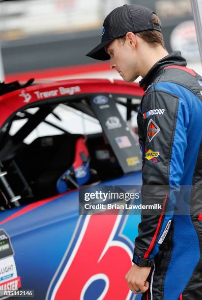 Trevor Bayne, driver of the Tim Duerr EcoBoost Ford, stands by his car during practice for the Monster Energy NASCAR Cup Series Bass Pro Shops NRA...