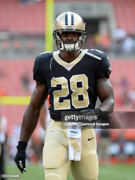 Running back Adrian Peterson of the New Orleans Saints walks onto the field prior to a preseason game on August 10, 2017 against the Cleveland Browns...