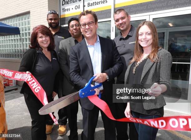 Sears Celebrates the Opening of DieHard Auto Centers. Pictured are: Patricia Langmaack, Project Manager; David Junior, Manager of the Troy DieHard...