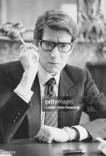 French fashion designer Yves Saint Laurent in the office of his Paris studio, January 1982.