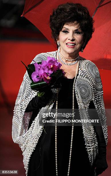 Italian actress Gina Lollobrigida arrives on the red carpet to present the documentary, "Gina Lollobrigida, Un simbolo italiano nel mondo" at the...