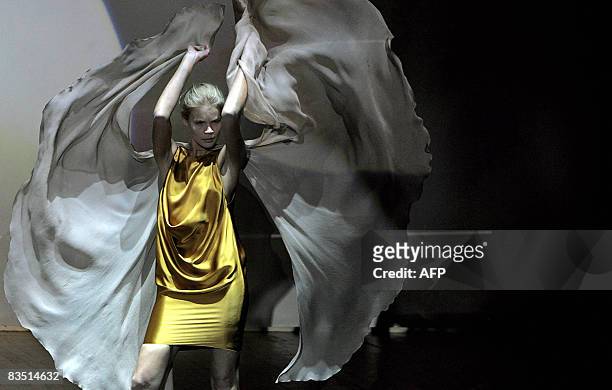 Model displays a creation by Russian fashion designer Cyrille Gassiline during the Russian Fashion Week on October 31, 2008 in Moscow. AFP PHOTO/...
