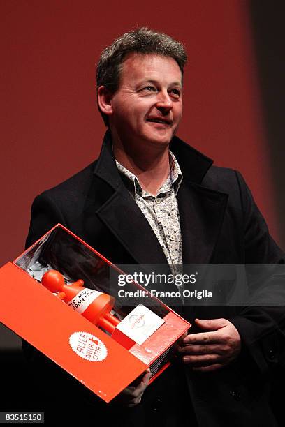 Director Kenneth Glenaan with his Alice Nella Citta award voted by the jury aged 13-17, for his film 'Summer' as he attends the 'Award Winners...