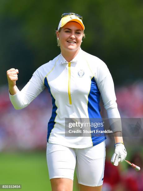 Charley Hull of Team Europe celebrates during the morning foursomes matches of The Solheim Cup at Des Moines Golf and Country Club on August 18, 2017...