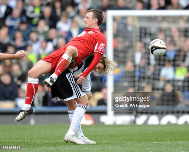 Derby County's Robbie Savage tangles with Bristol City's Gavin Williams during the Coca-Cola Championship match at Pride Park, Derby.