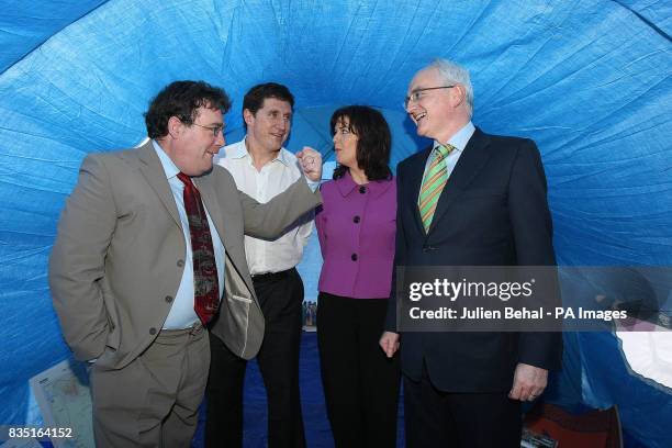 Senator Dan Boyle, Minister Eamon Ryan, Senator Deirdre De Burca and Green Party Leader John Gormley pose for a photo in the UNHCR Tent during the...