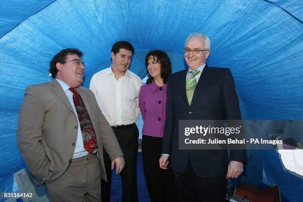 Senator Dan Boyle, Minister Eamon Ryan, Senator Deirdre De Burca and Green Party Leader John Gormley pose for a photo in the UNHCR Tent during the...