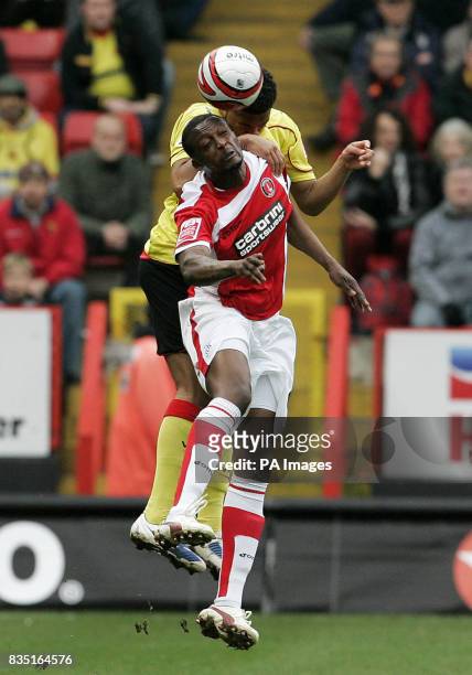 Charlton Athletic's Tresor Kandol competes for the ball with Watford's Adrian Mariappa during the Coca-Cola Championship match at The Valley,...
