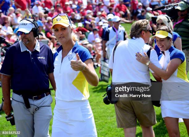 Anna Nordqvist of Team Europe reacts as she leaves the 17th green with Georgia Hall after beating Team USA two up during the morning foursomes...