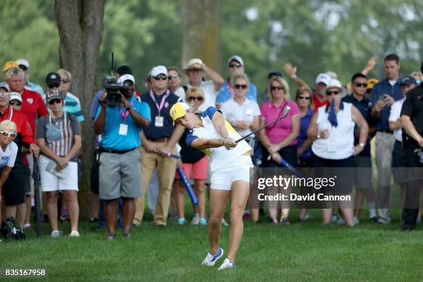 Melissa Reid of England the European Team hits her second shot on the par 4, 12th hole in her match with Charley Hull against Cristie Kerr and Lexi...