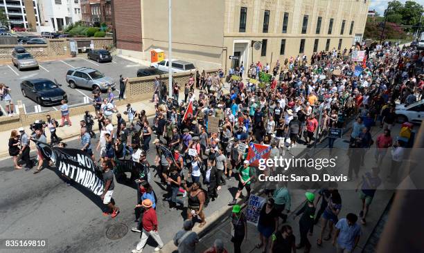 Counter protesters march against a potential white supremacists rally on August 18, 2017 in Durham, North Carolina. The demonstration comes a week...