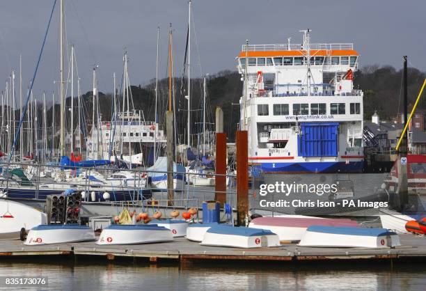 The new W-class Wightlink ferry Wight Sky departs Lymington in the New Forest en-route to Yarmouth on the Isle of Wight as one of the old and much...