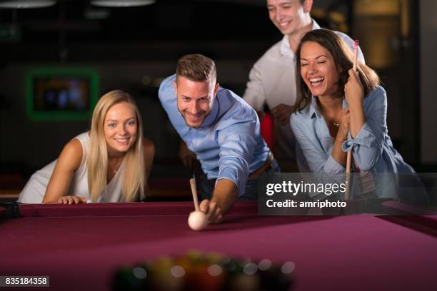 young people playing pool - playing pool stock pictures, royalty-free photos & images