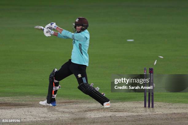 Sam Curran of Surrey is bowled by Adam Milne of Kent Spitfires during the NatWest T20 Blast South Group match between Kent Spitfires and Surrey at...