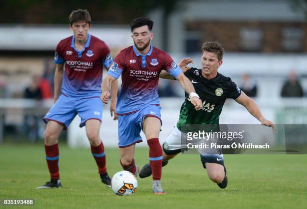Bray , Ireland - 18 August 2017; Adam Wixted of Drogheda United, supported by team-mate Jake Hyland, left, in action against John Sullivan of Bray...