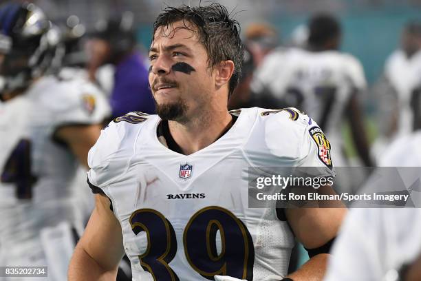 Running back Danny Woodhead of the Baltimore Ravens looks on during a preseason game against the Miami Dolphins at Hard Rock Stadium on August 17,...