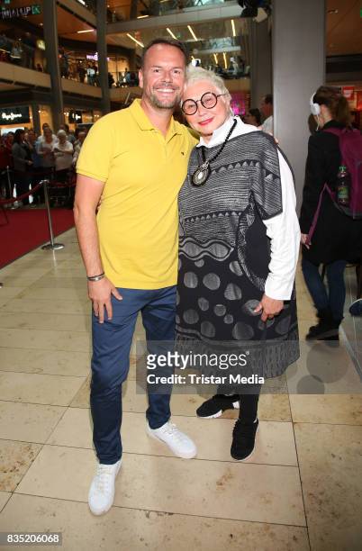 Lee Baxter with PR Lady Brigitte Sely during his autograph session at Europacenter on August 18, 2017 in Hamburg, Germany.