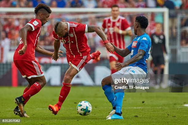 Kingsley Coman of Bayern Muenchen Franck Ribery of Bayern Muenchen and Amadou Diawara of Napoli battle for the ball during the Audi Cup 2017 match...