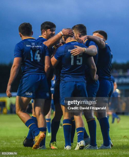 Dublin , Ireland - 18 August 2017; Jordan Larmour of Leinster is congratulated by team-mates after scoring his side's sixth try during the Bank of...