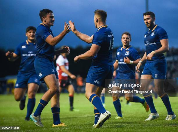 Dublin , Ireland - 18 August 2017; Jordan Larmour of Leinster is congratulated by team-mates after scoring his side's sixth try during the Bank of...