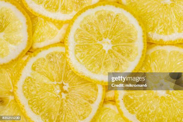 ripe, sliced, fresh fruits, organic lemon fruit - lemons stock pictures, royalty-free photos & images