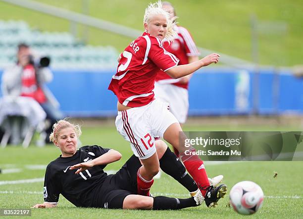 Rosie White of New Zealand and Pernille Harder of Denmark in action during the FIFA U-17 Women's World Cup match between New Zealand and Denmark at...