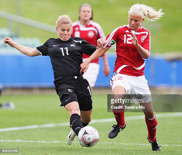 Rosie White of New Zealand and Pernille Harder of Denmark in action during the FIFA U-17 Women's World Cup match between New Zealand and Denmark at...