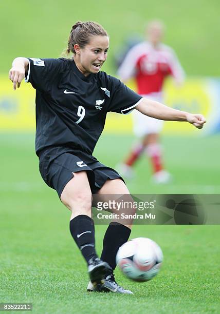 Hannah Wall of New Zealand looks for support as she kicks the ball during the FIFA U-17 Women's World Cup match between New Zealand and Denmark at...