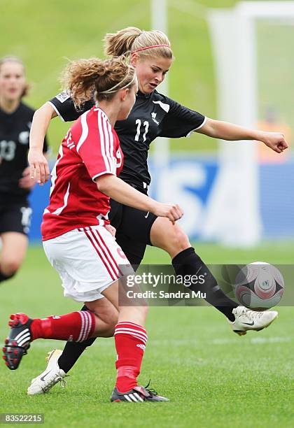 Rosie White of New Zealand kicks the ball during the FIFA U-17 Women's World Cup match between New Zealand and Denmark at North Harbour Stadium on...