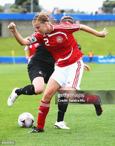 Sarah McLaughlin of New Zealand and Line Ostergaard of Denmark in action during the FIFA U-17 Women's World Cup match between New Zealand and Denmark...