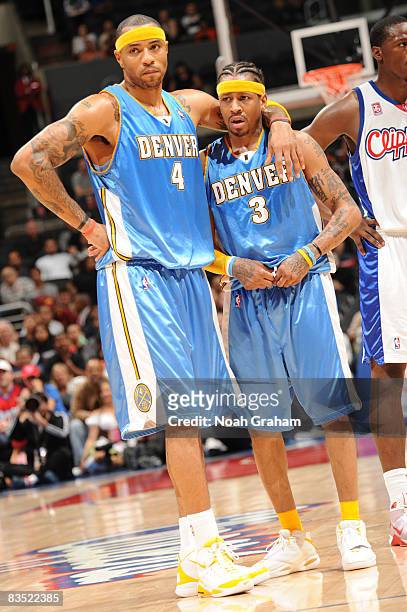 Kenyon Martin and Allen Iverson of the Denver Nuggets stand together during their game against the Los Angeles Clippers at Staples Center on October...