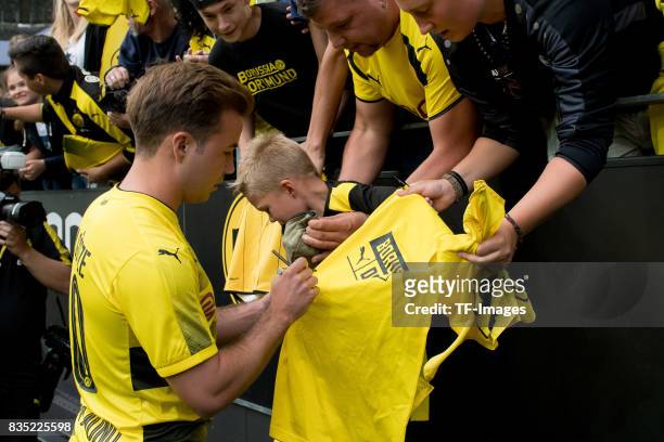 Mario Goetze of Dortmund gives autographs during the Borussia Dortmund Season Opening 2017/18 at Signal Iduna Park on August 4, 2017 in Dortmund,...