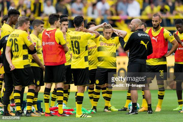 Head coach Peter Bosz of Dortmund speak with the players during the Borussia Dortmund Season Opening 2017/18 at Signal Iduna Park on August 4, 2017...