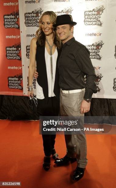 Mikey Graham of Boyzone and wife Karen Corradi arriving at the Meteor Ireland Music Awards 2009, at the RDS, Dublin, Ireland.