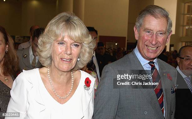 Camilla, Duchess of Cornwall and Prince Charles, Prince of Wales laugh as they are taken on a tour of Brunei Darussalam University on November 1,...