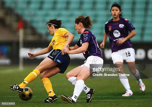 Trudy Camilleri of the Mariners competes with Collette McCallum of the Glory during the round two W-League match between the Central Coast Mariners...