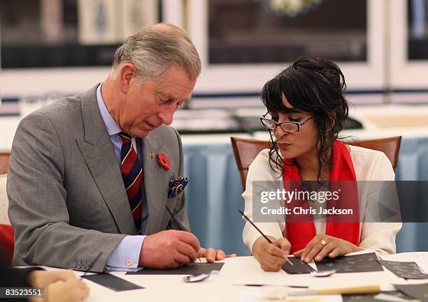 Prince Charles, Prince of Wales is given a lesson in Islamic art as he is taken on a tour of Brunei Darussalam University on November 1, 2008 in...