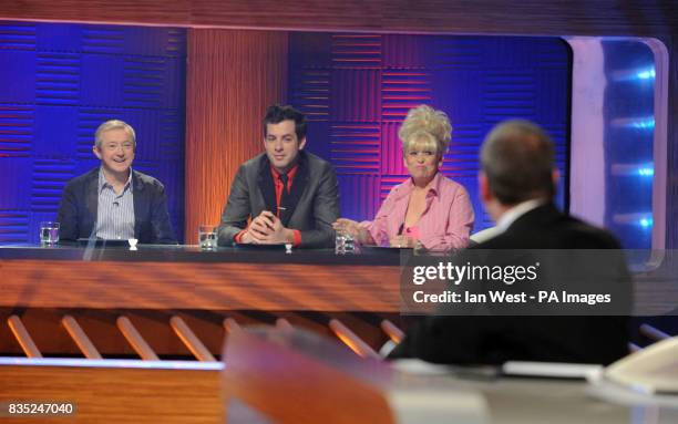 Louis Walsh, Mark Ronson, Barbara Windsor and Chris Moyles during filming of the television programme Chris Moyles Quiz Night at the London Studios...