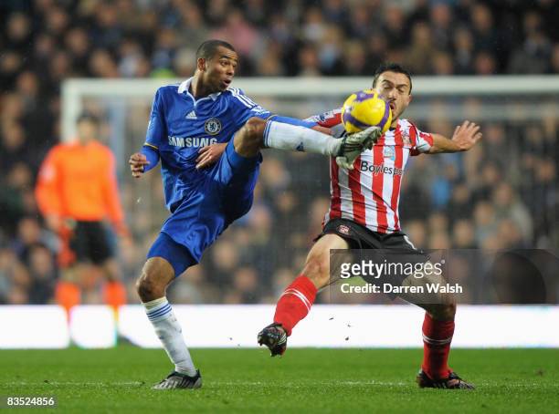 Steed Malbranque of Sunderland is challenged by Ashley Cole of Chelsea during the Barclays Premier League match between Chelsea and Sunderland at...