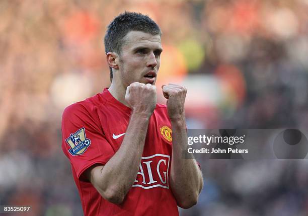 Michael Carrick of Manchester United celebrates scoring their second goal during the Barclays Premier League match between Manchester United and Hull...